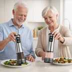 Senior couple using electric pepper grinders in a kitchen setting.