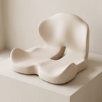 White abstract sculpture on a light beige surface