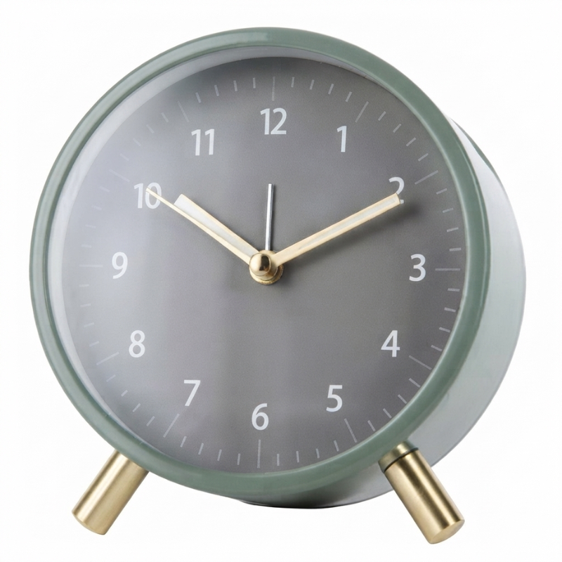 Round clock with green casing and gold accents on a white background