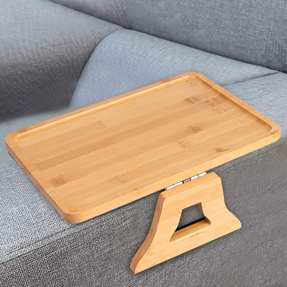 Wooden tray with stand on a gray sofa