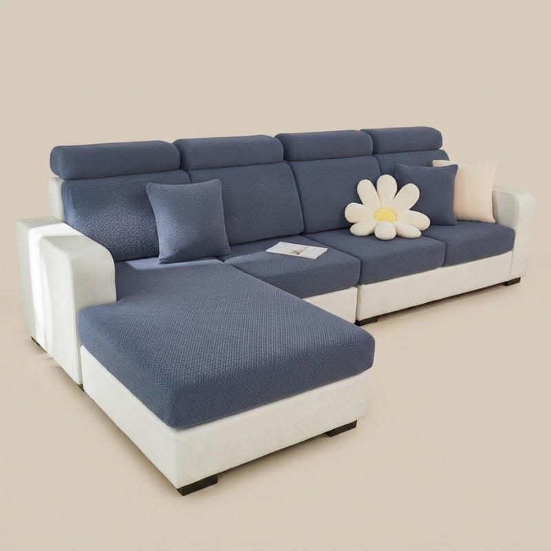 Blue and white sectional sofa with decorative pillows on a beige background
