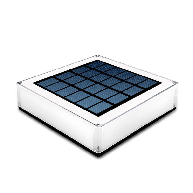 Solar panel in a clear plastic box on a white background