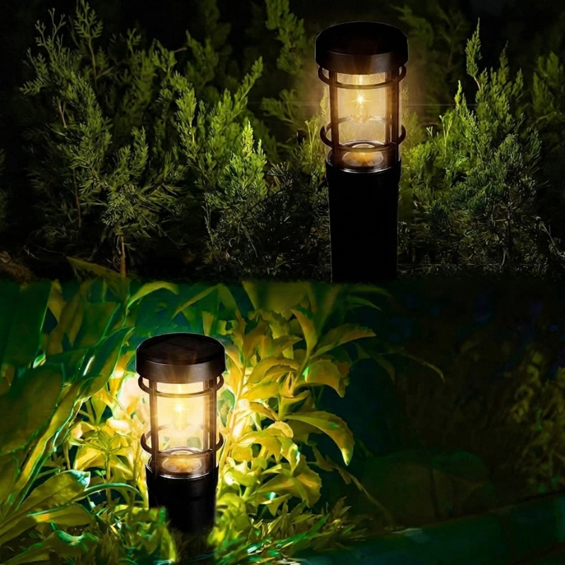 Two solar-powered garden lights illuminating a grassy area at night.