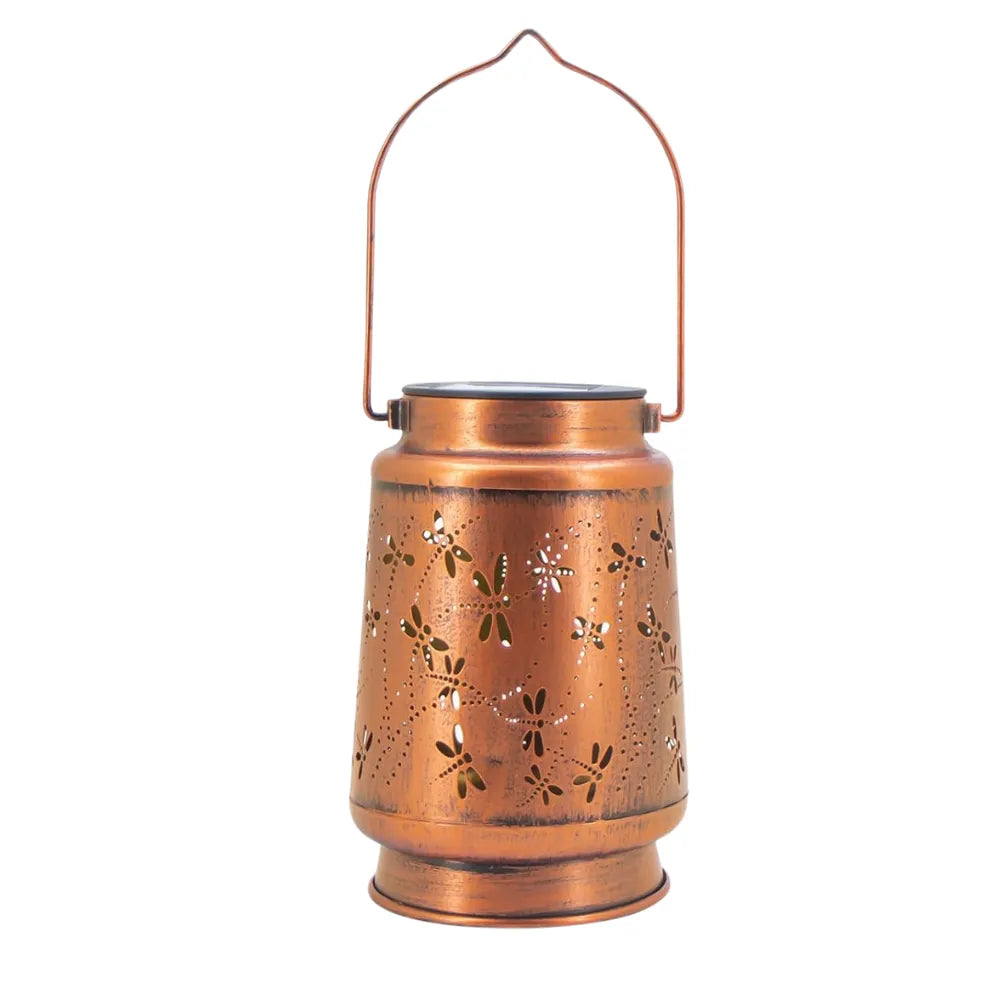 Copper lantern with floral patterns on a white background