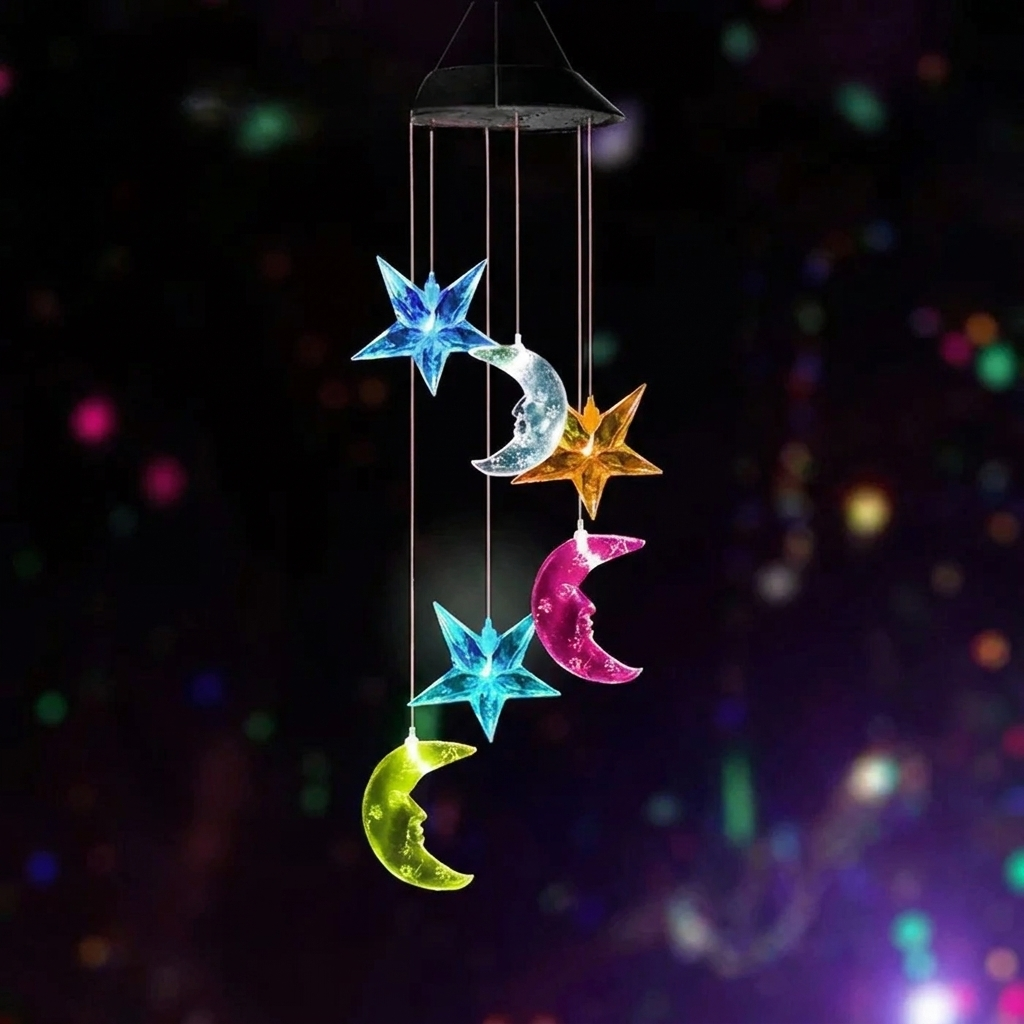 Colorful star and moon-shaped hanging decoration against a dark background with bokeh lights.