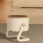 White pet stand with brown top on a textured surface