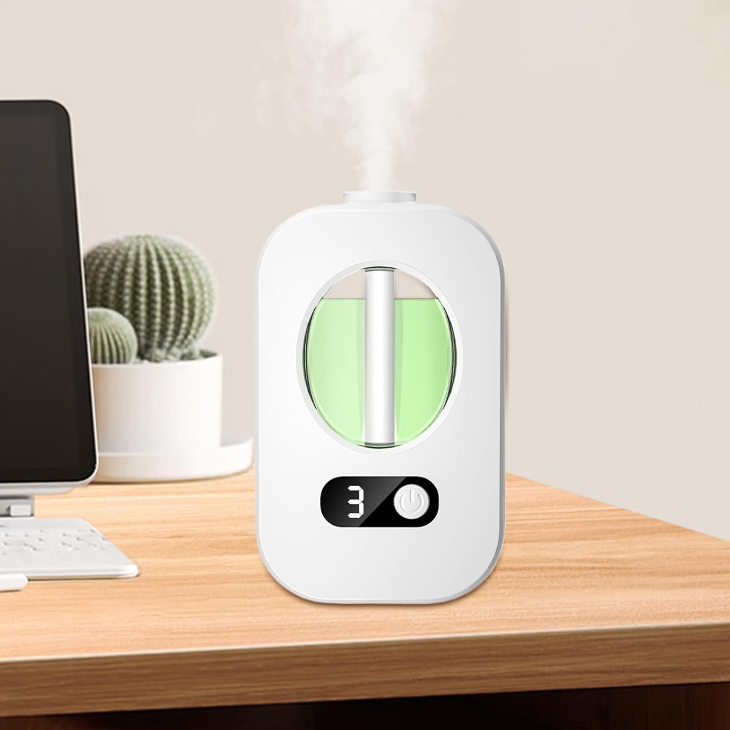 White humidifier on a desk with a cactus in the background