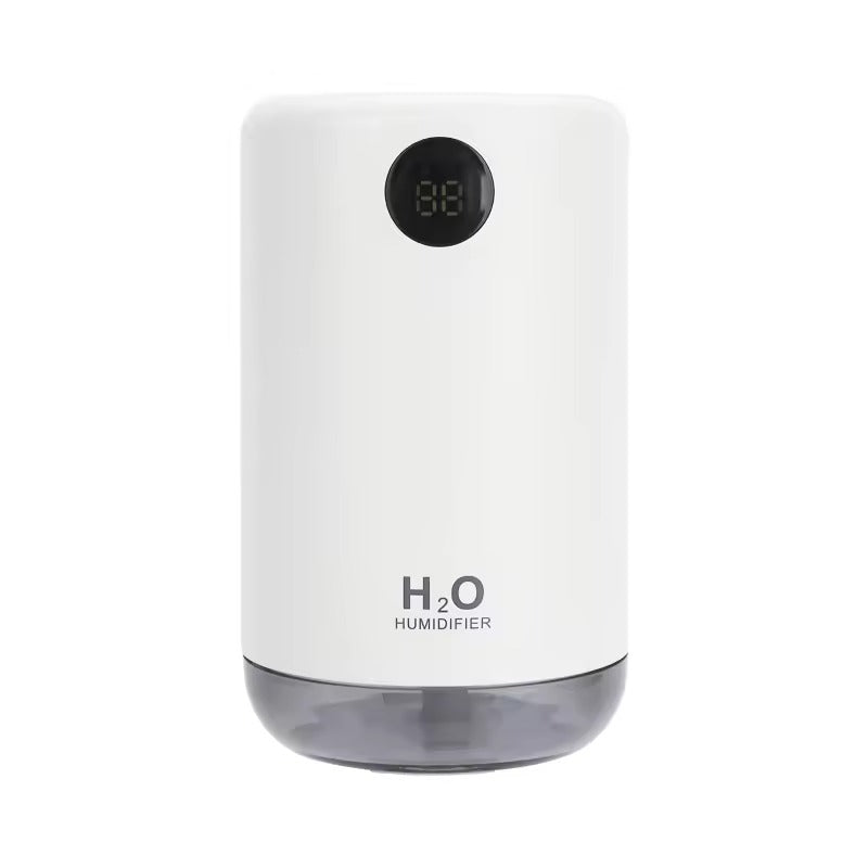 White humidifier with digital display on a white background