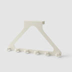 An off-white triangular wall hook rack with five small round peg hooks along the bottom edge, shown on a light gray background.