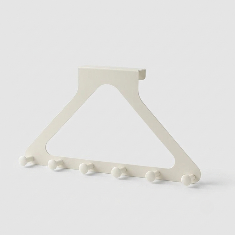 An off-white triangular wall hook rack with five small round peg hooks along the bottom edge, shown on a light gray background.