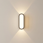 Modern wall lamp on a light gray wall