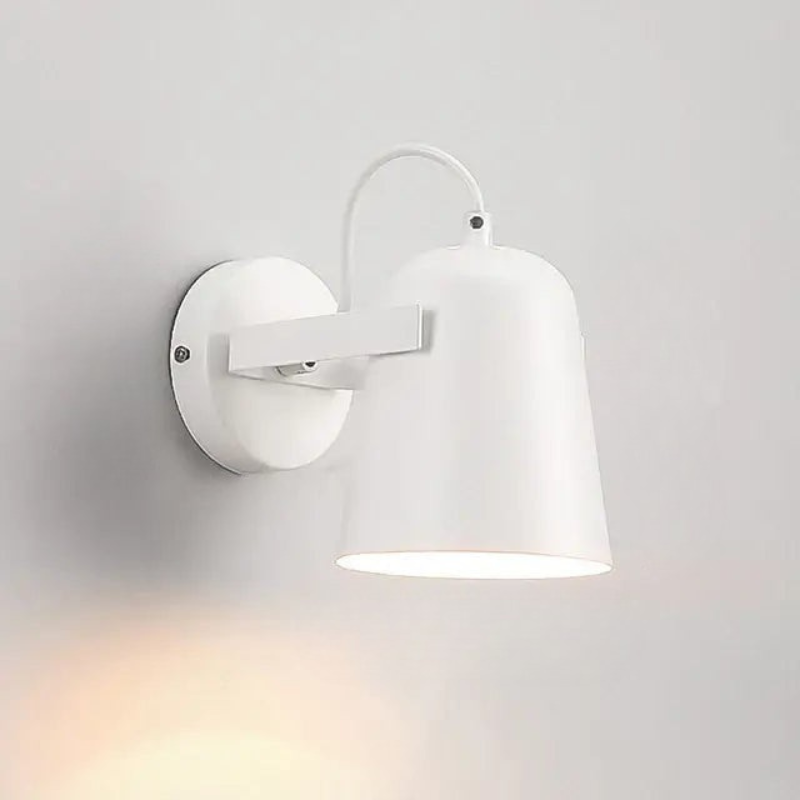 White wall-mounted lamp on a light gray background