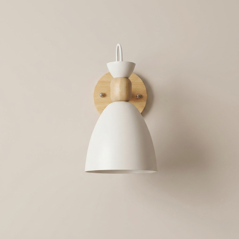 Wall-mounted light fixture with white shade and wooden base on a beige background