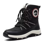 A black winter lace-up boot with white faux-fur lining at the collar, white dotted strap accents, a thick white midsole, and a circular logo patch on the side.
