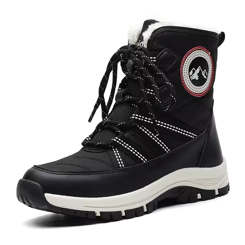 A black winter lace-up boot with white faux-fur lining at the collar, white dotted strap accents, a thick white midsole, and a circular logo patch on the side.