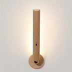Wooden wall-mounted light fixture on a white background