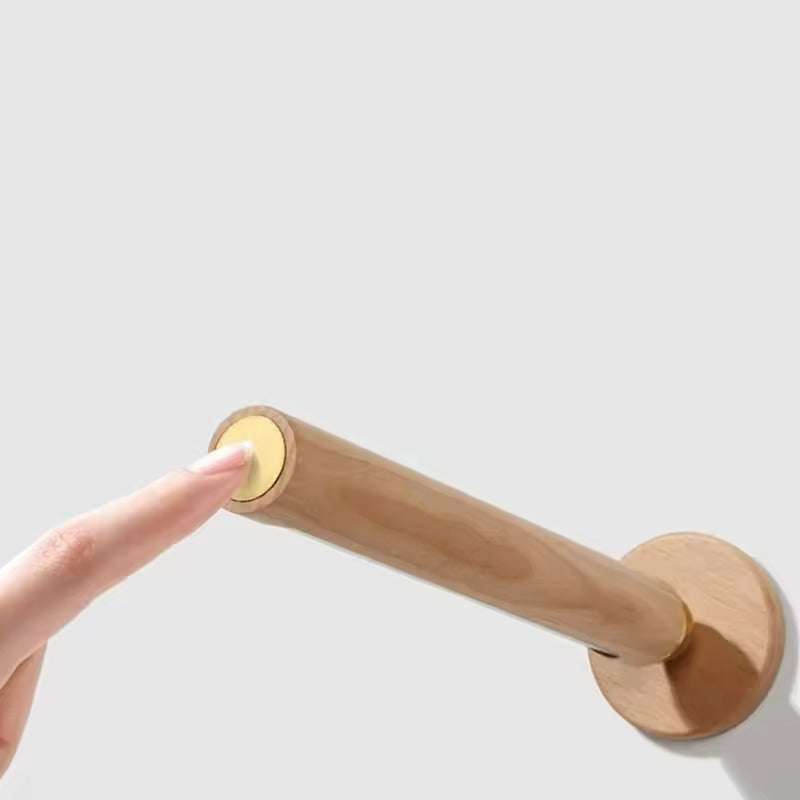 Wooden handle with a gold accent on a white background