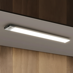 Under-cabinet LED light fixture in a kitchen setting