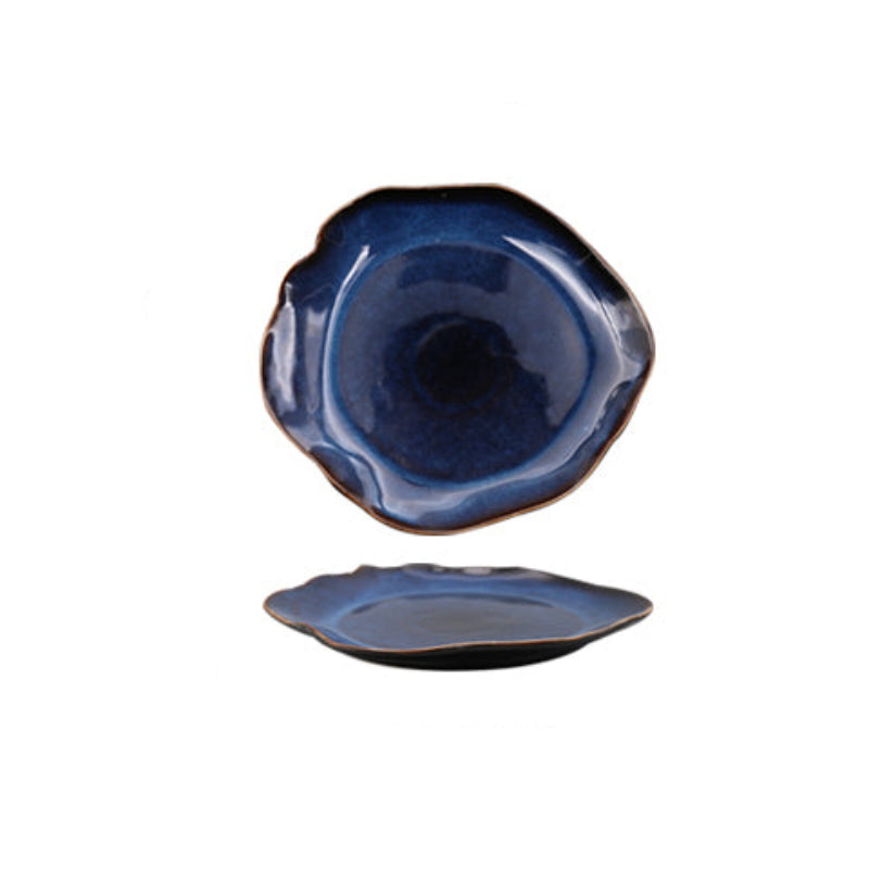 Blue ceramic plate with dimensions and weight information on a white background