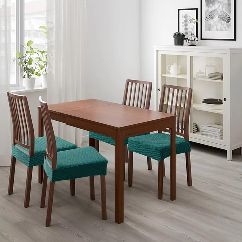 Dining room with wooden table and chairs in a home setting
