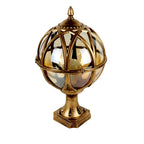 Decorative gold lantern with glass sphere on a white background