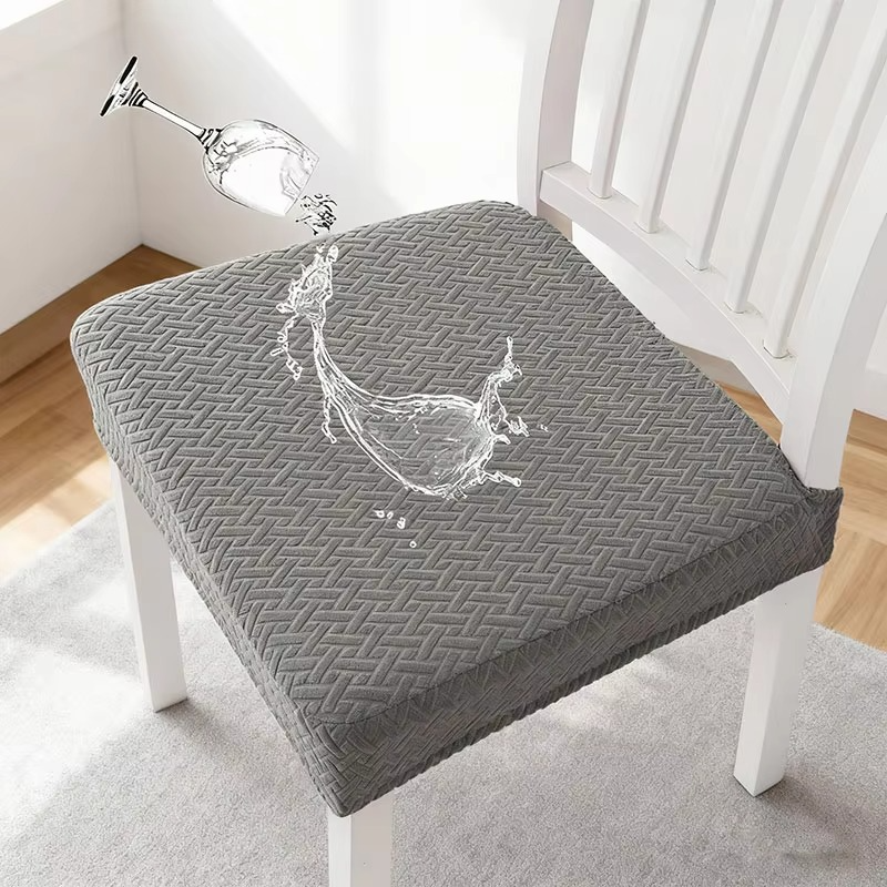 Gray chair cushion on a white chair with water droplet graphic