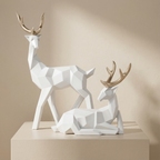 Geometric deer sculptures on a beige background