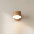 Wooden wall light fixture on a neutral background