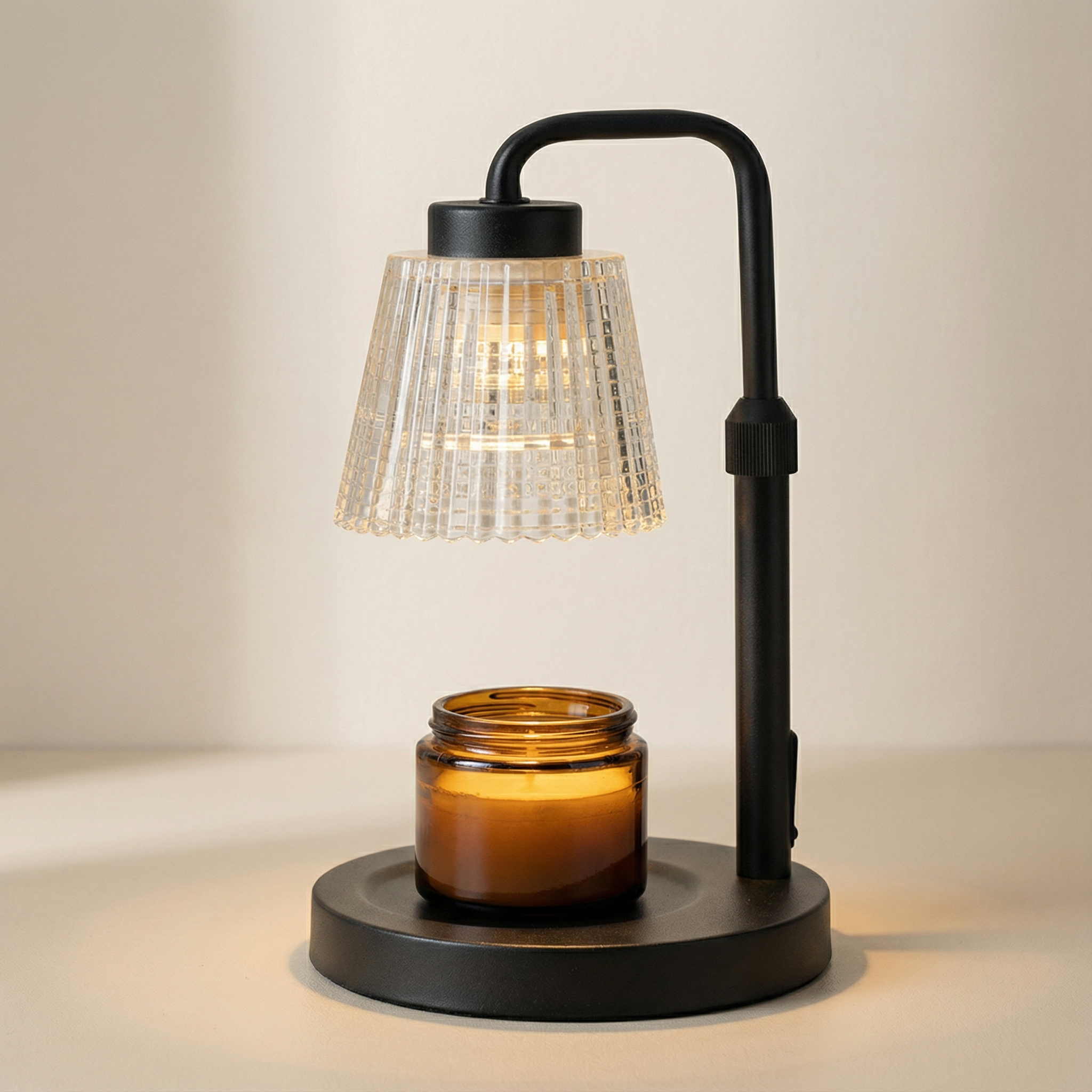 Table lamp with a glass candle holder on a neutral background