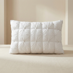 White quilted pillow on a beige bed