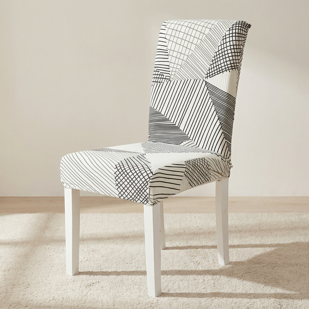 Chair with a patterned cover on a light wooden floor and beige wall background