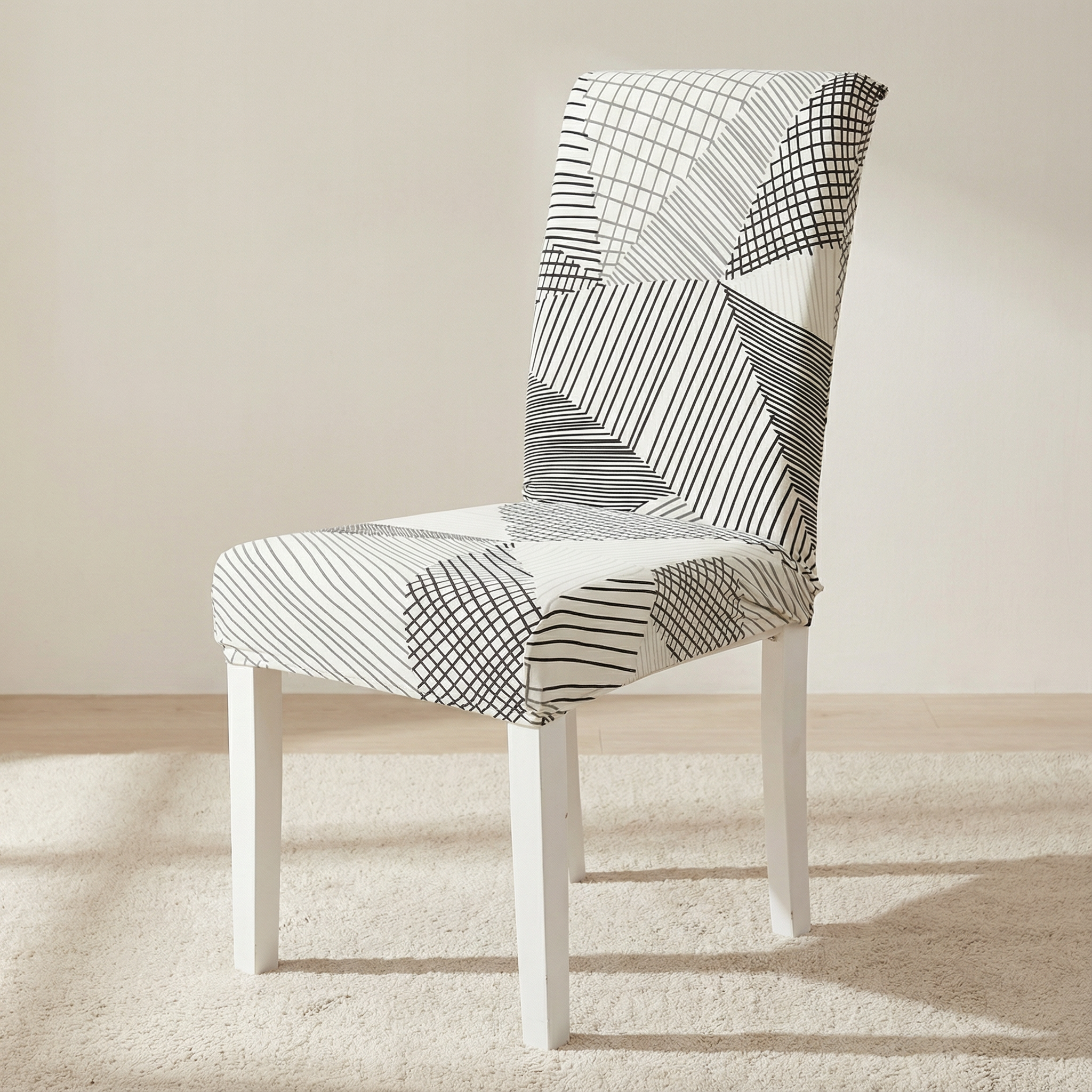 Chair with a patterned cover on a light wooden floor and beige wall background