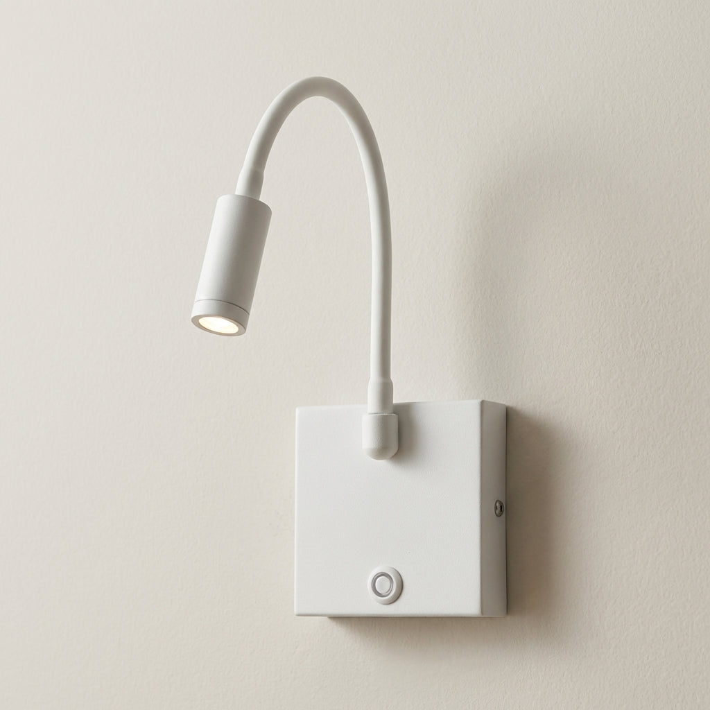 White wall-mounted reading light with flexible arm on a beige wall.
