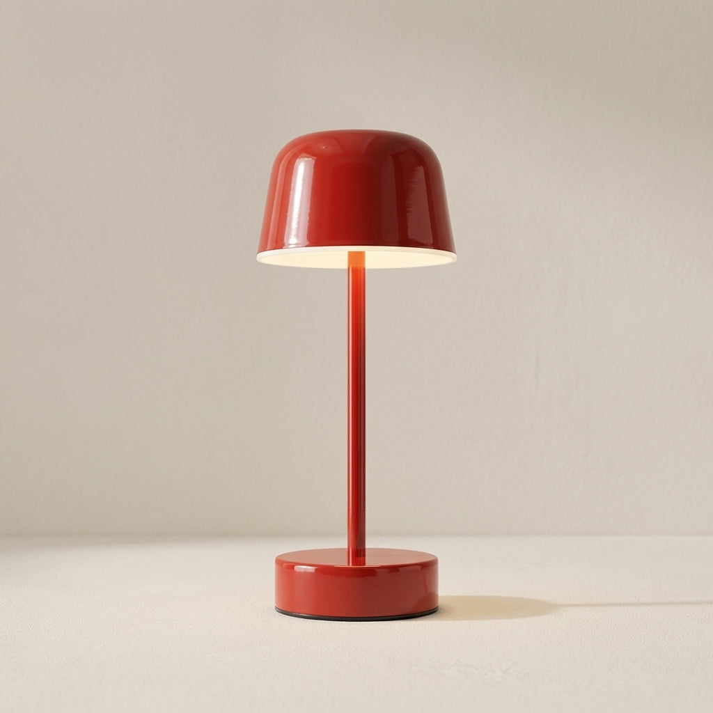Red table lamp on a beige background