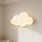 Cloud-shaped wall light fixture on a neutral wall