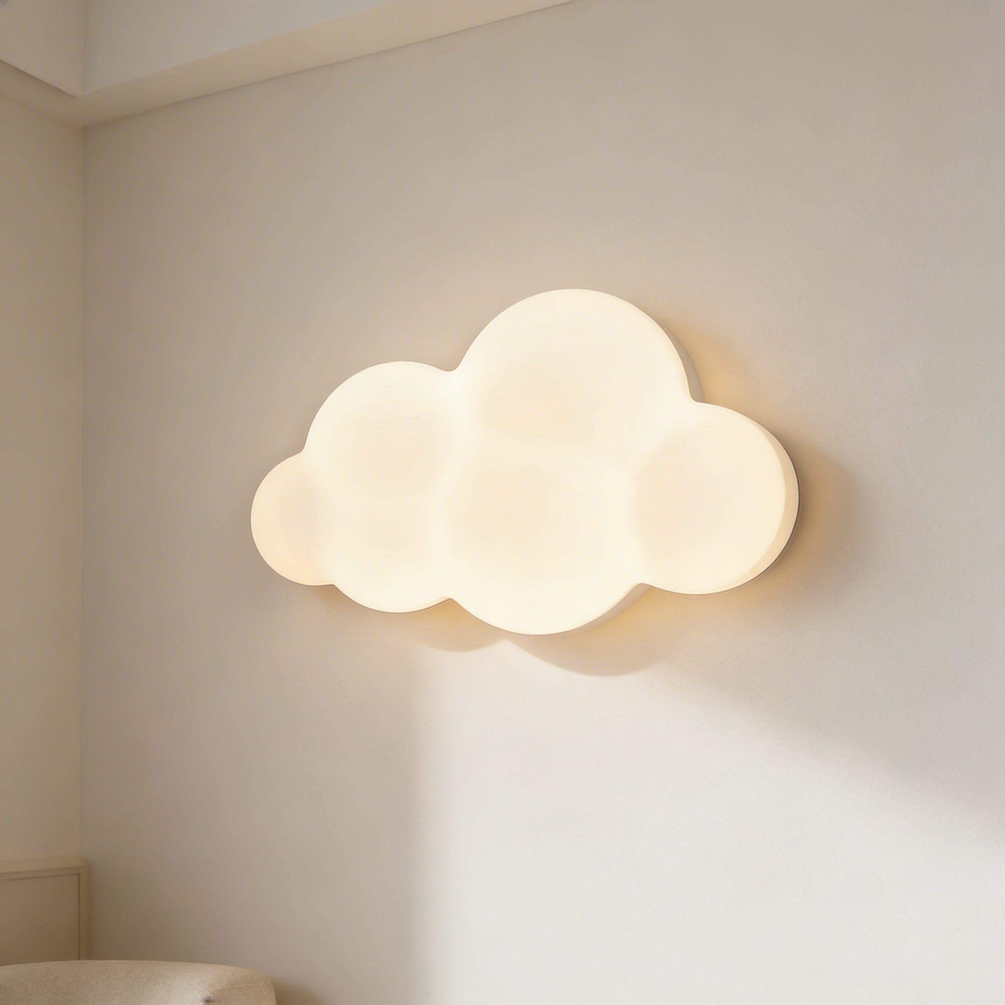 Cloud-shaped wall light fixture on a neutral wall