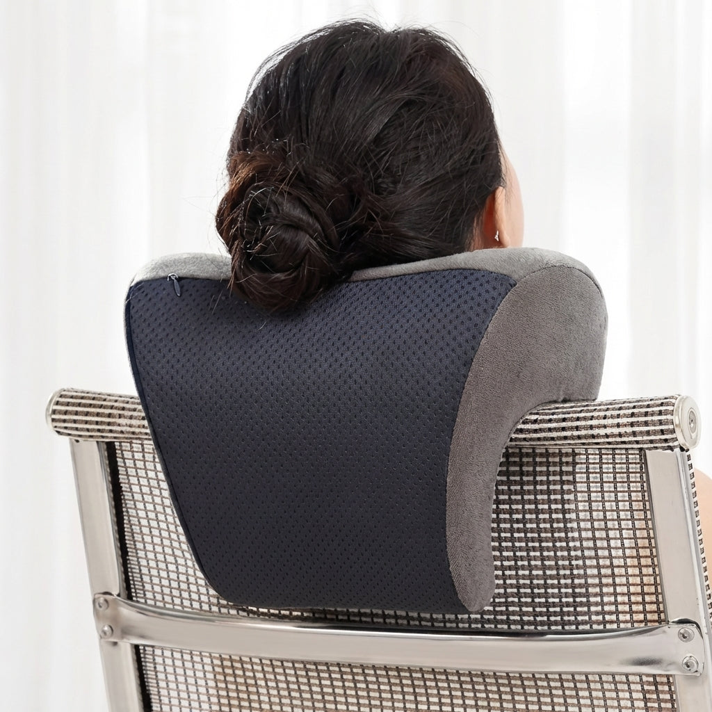 Person using a mesh back support pillow on a chair with a white background