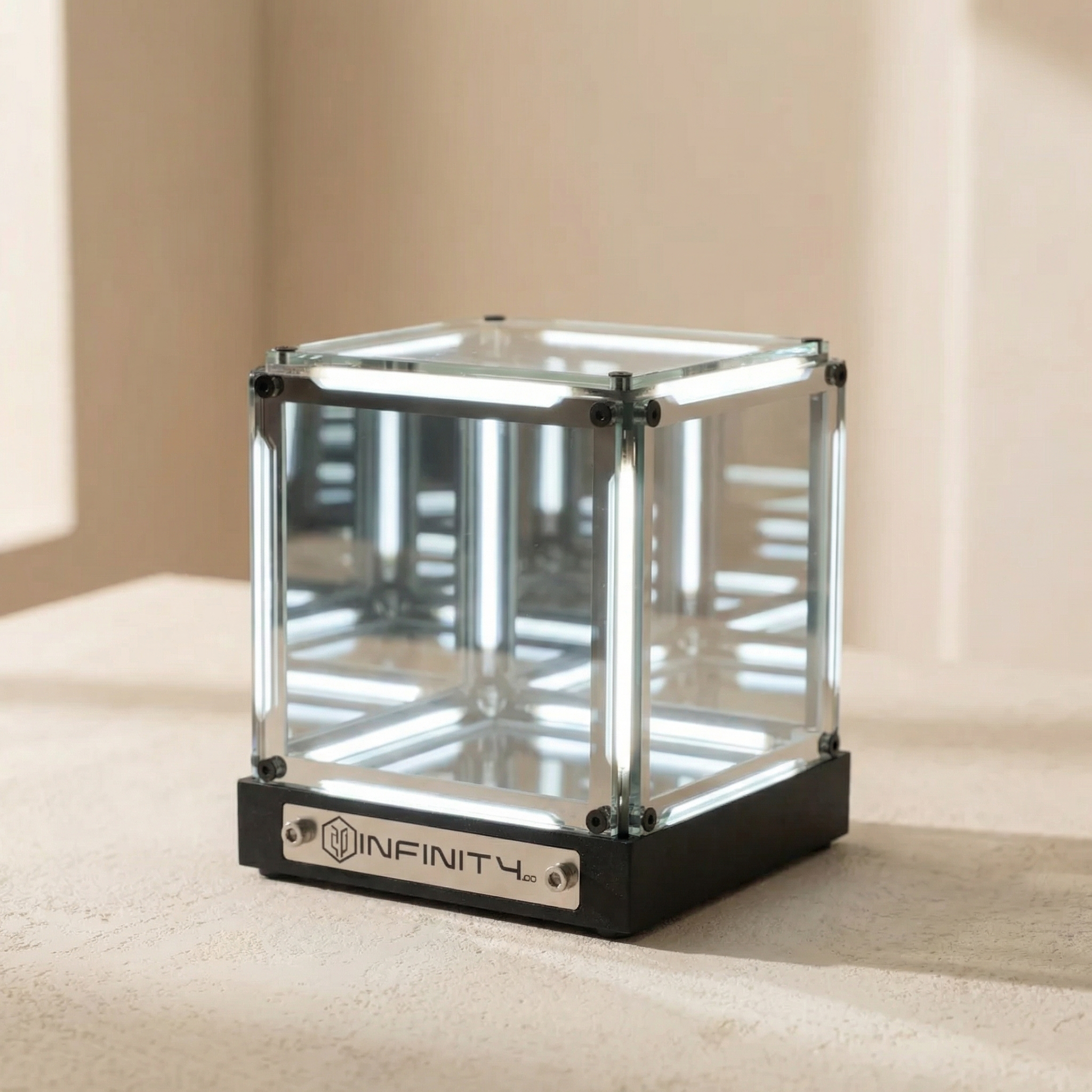 Clear cube with black base on a beige surface