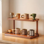 Wooden shelf with ceramic mugs on a wooden surface