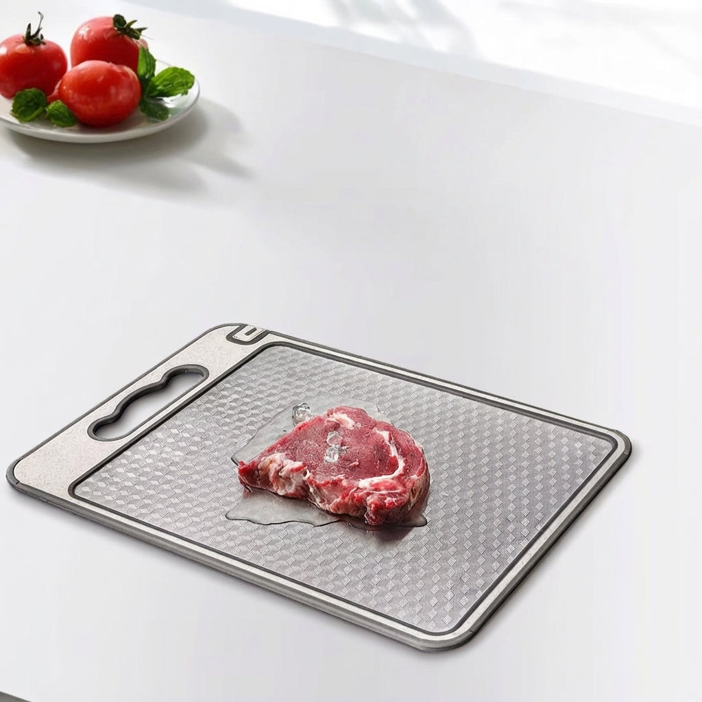 Butcher block cutting board with a piece of meat on a white surface