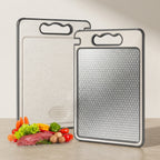 Two cutting boards with textured surface on a neutral background