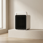 Portable air conditioner on a white surface with a light background
