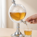 Globe-shaped decanter with a hand pouring liquid into a glass on a neutral background