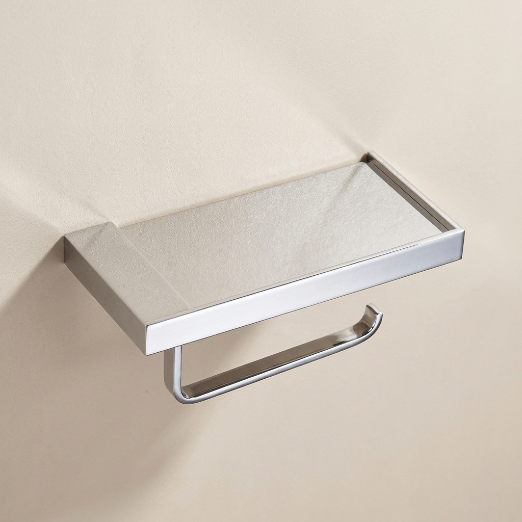 Chrome toilet paper holder with tissue on a beige wall