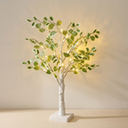 Decorative tree with lights on a plain background