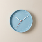 Blue wall clock on a beige background