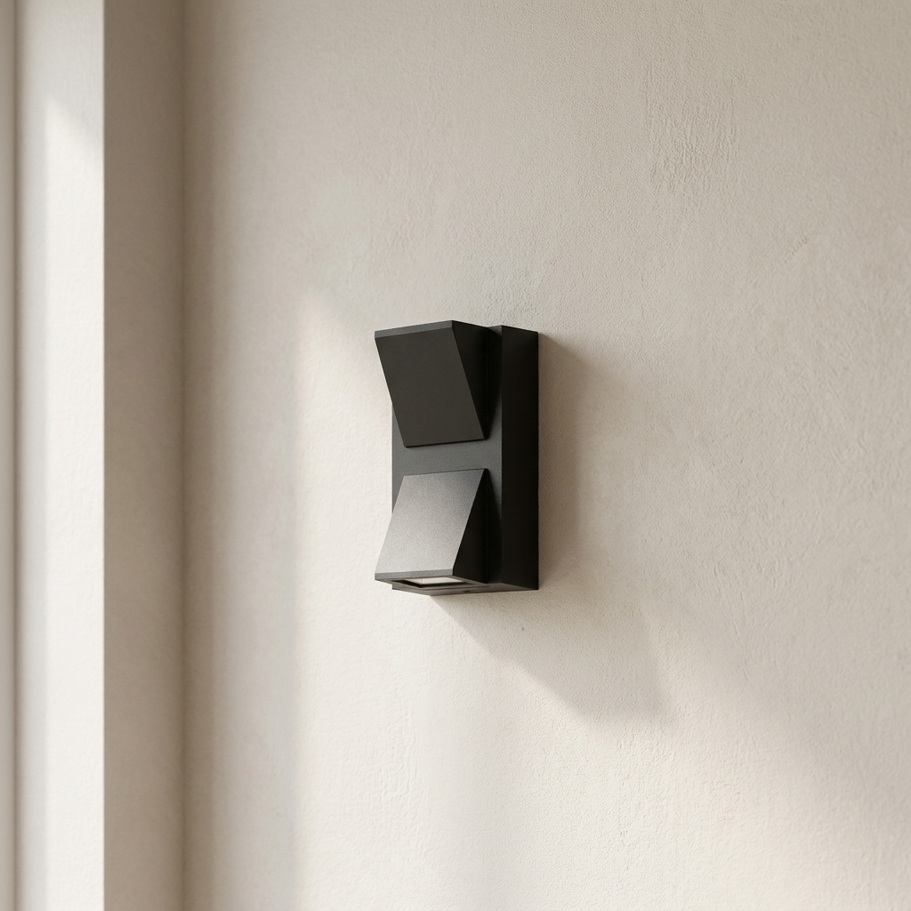 Modern wall-mounted light fixture on a neutral wall