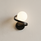 Modern wall light fixture on a plain wall