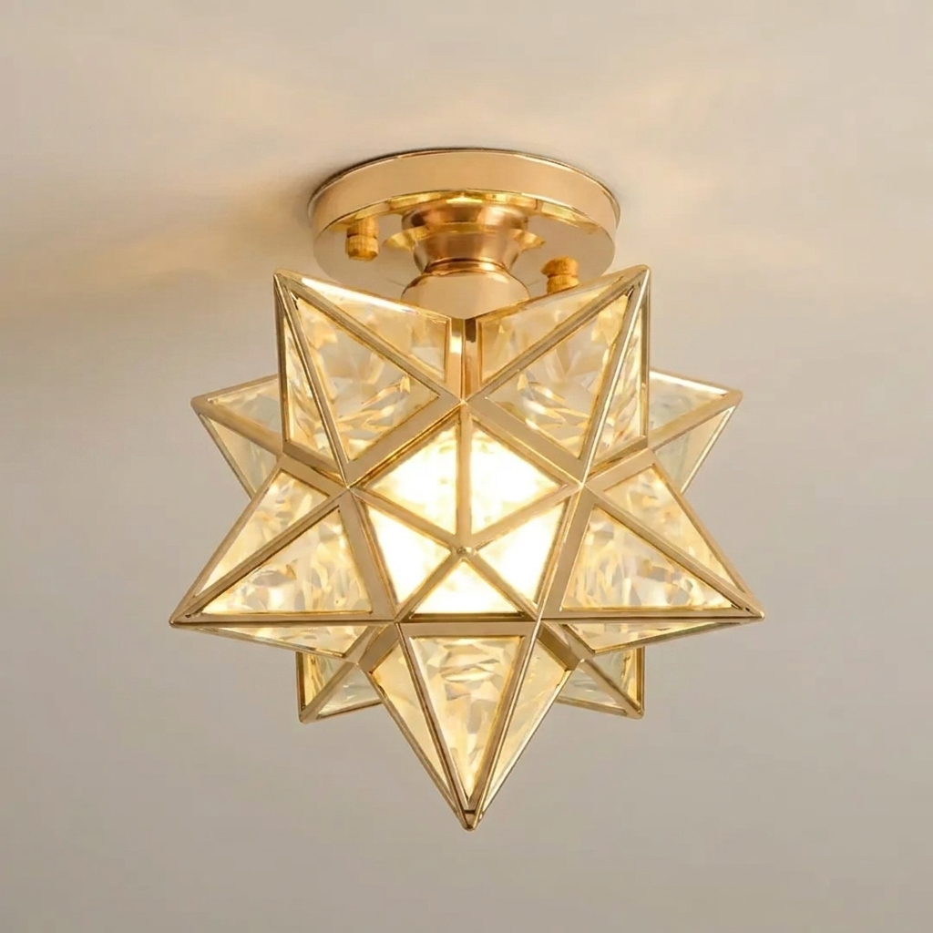 Gold geometric ceiling light fixture on a neutral background