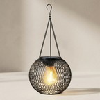 Decorative hanging light with mesh design on a neutral background